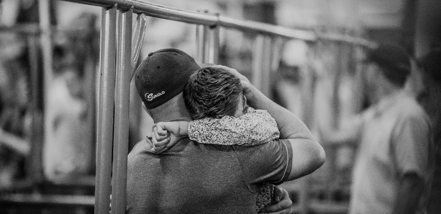 dad and son hugging